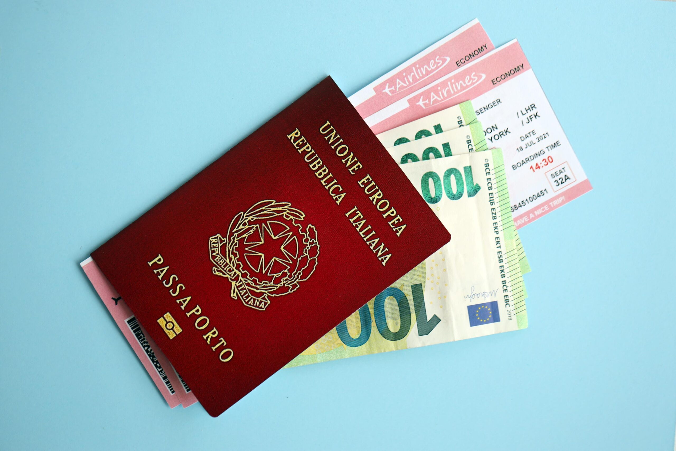 italian-passport-with-money-and-airline-tickets-on-2025-03-13-06-51-58-utc